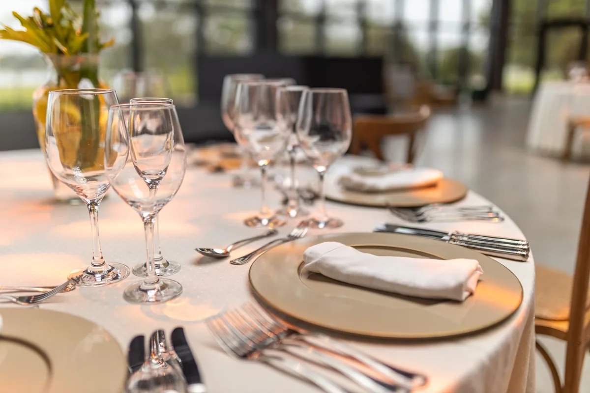 Wine glasses set on a restaurant table
