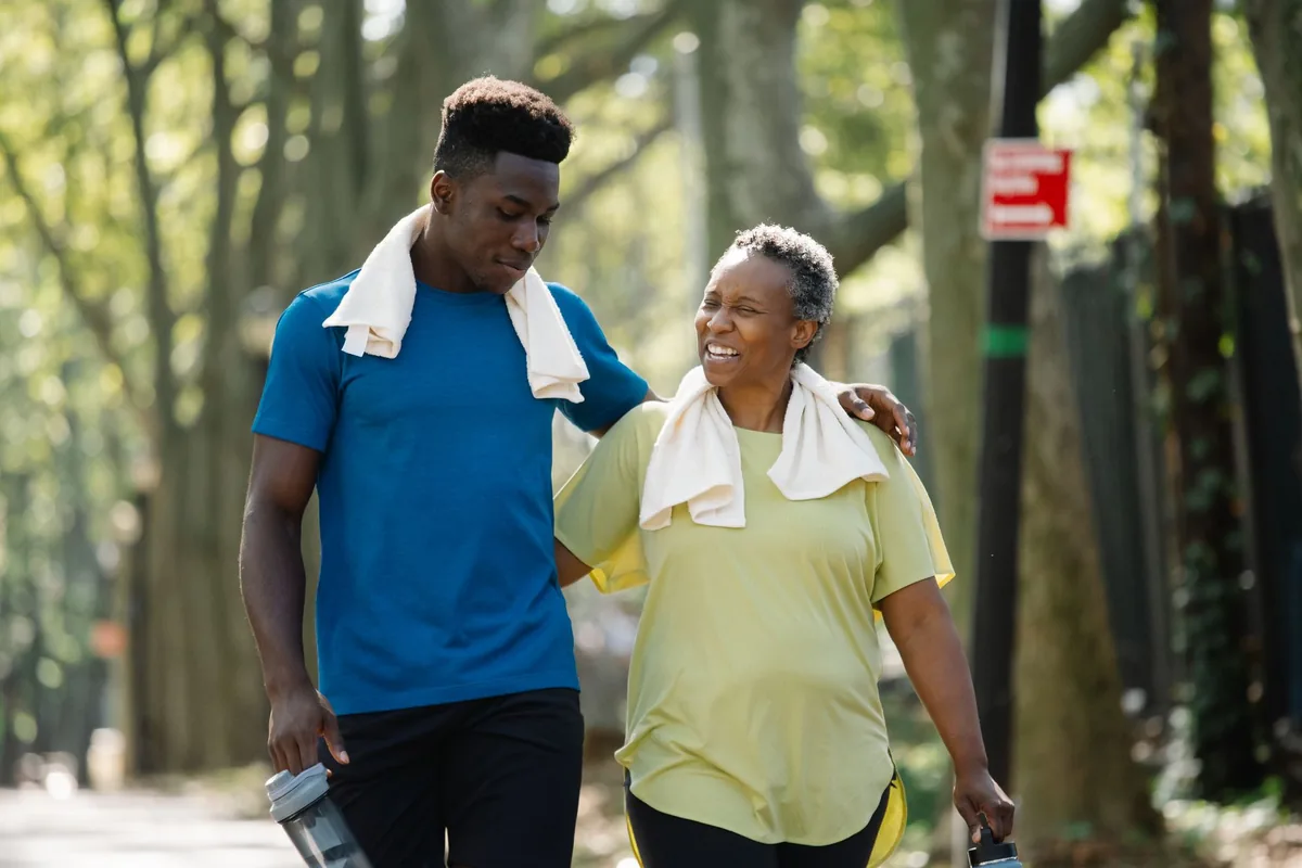 Two people walking together outdoors